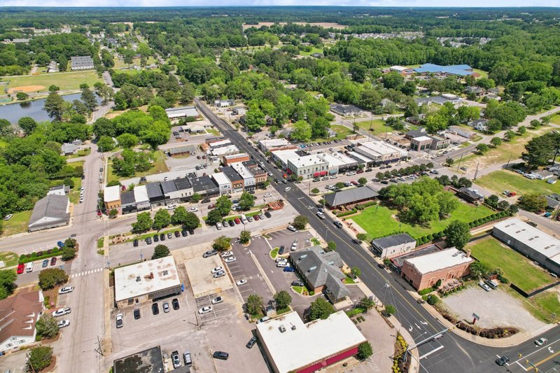 Aerial view of Angier, North Carolina with nearby lake and neighborhoods.