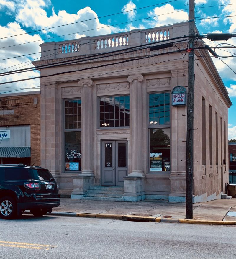 Clayton Chamber of Commerce building with neoclassical columns in downtown Clayton NC