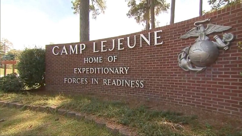 The Camp Lejeune entrance sign reading Home of Expeditionary Forces in Readiness in Jacksonville, NC.