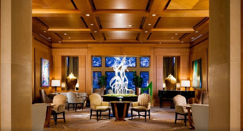 The Umstead Hotel and Spa interior lobby with seating and art in Raleigh, North Carolina.