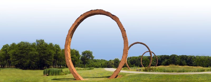 Large circular outdoor sculptures at the North Carolina Museum of Art park in Raleigh, North Carolina.