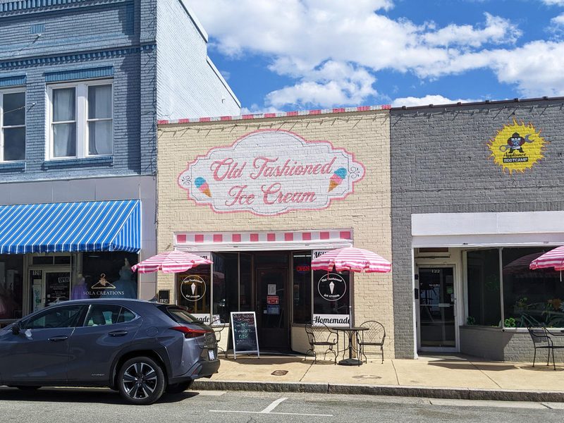 Old Fashioned Ice Cream storefront with striped awnings and small-town street view in Selma, North Carolina.