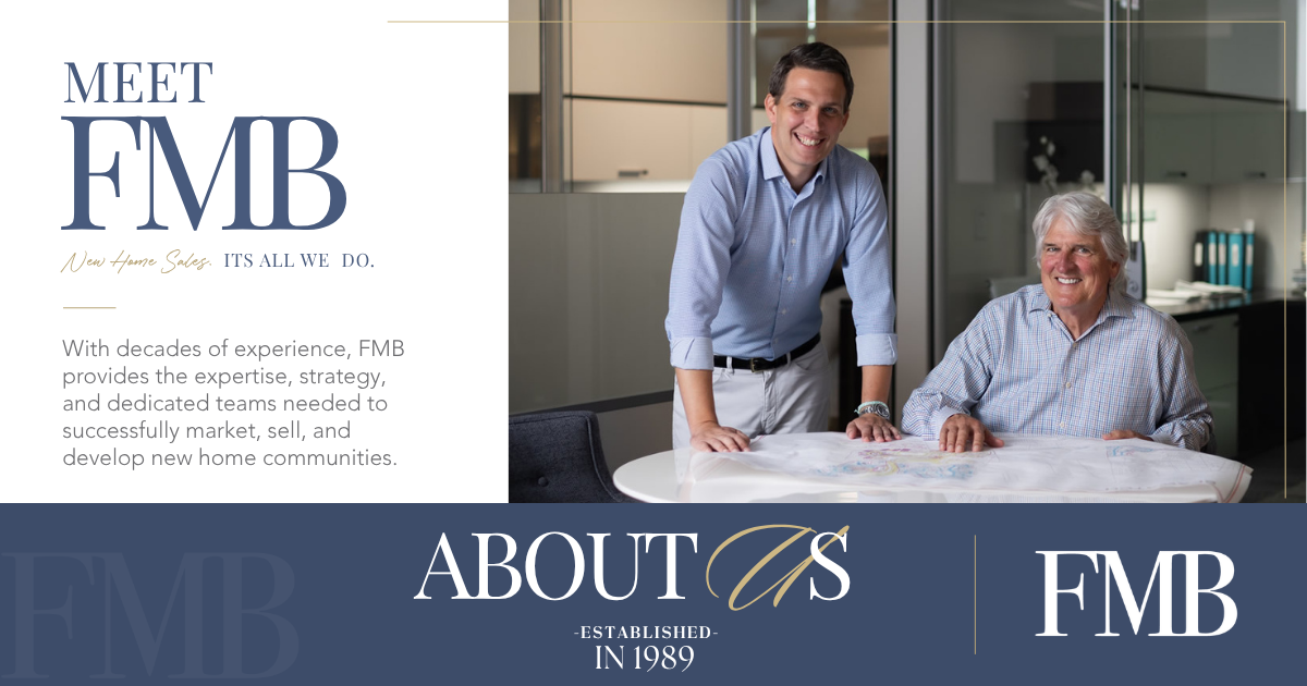 FMB team members reviewing new home community plans at a table